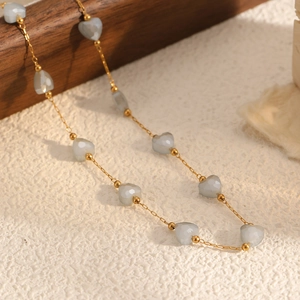 Elegant heart-shaped grey crystal beaded necklace with minimalist golden chain design