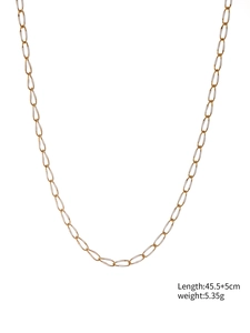 Detail of gold link chain necklace with white enamel drips and size specifications