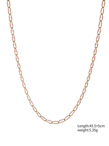 Detail of gold-plated chain necklace with pink enamel oval links and size specifications