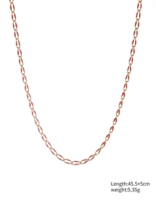Detail view of gold stainless steel link chain with red enamel coating and measurements