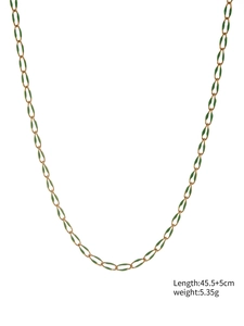 Detail of gold stainless steel necklace with green enamel charms and 45.5+5cm adjustable chain