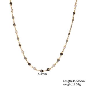 Gold chain necklace with black, white and grey enamel heart charms, 45.5cm length