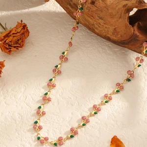Golden 304 stainless steel chain necklace featuring pink glittery cherry and green leaf charms