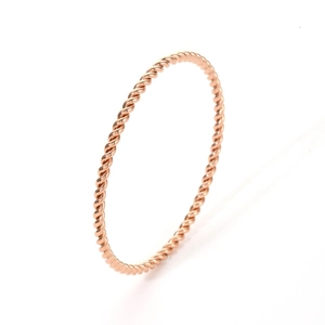 Minimalist twisted rope ring in rose gold finish with polished stainless steel texture