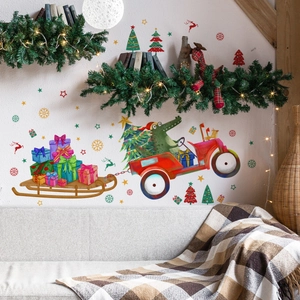 Detailed Christmas wall decal showing a cartoon crocodile driving a red car with gifts