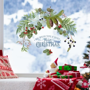 Detailed Christmas window sticker with pine cones, berries, and festive holiday typography