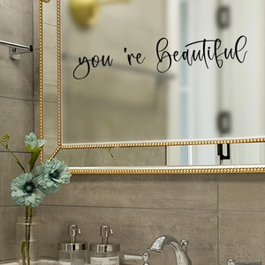 Detail view of you're Beautiful mirror decal with elegant black handwriting script