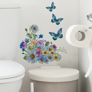 Detail of floral butterfly wall decals with blue daisies and pansies on bathroom wall