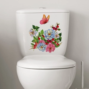 Close-up of floral butterfly toilet decal with watercolor finish on white ceramic tank