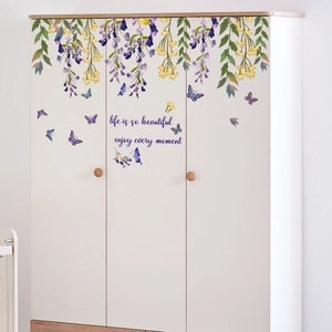 Detail of floral butterfly wall stickers with life is so beautiful quote on white closet