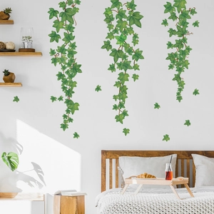 Green vine wall decals for bedroom decor with hanging ivy leaves and natural hand-drawn style