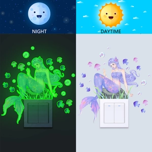 Luminous mermaid light switch decal showing glow-in-the-dark effect day and night