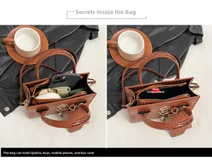 Detail view of the spacious interior of a brown crocodile pattern crossbody bag with compartments