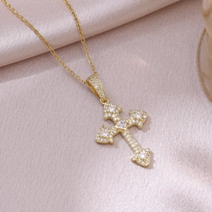 Hip hop cross pendant necklace with zircon stones on champagne silk background