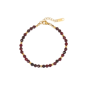 Elegant natural garnet beaded bracelet with gold accents and extension chain on white background