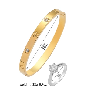 Gold clover bangle with crystals and silver cubic zirconia ring set for women