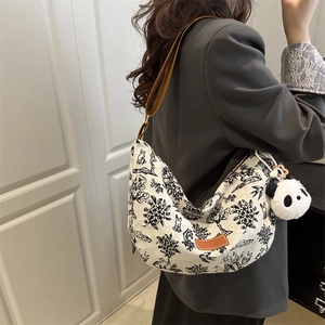 Borsa tote in tela retrò con stampe bianche e nere e tracolla regolabile in pelle