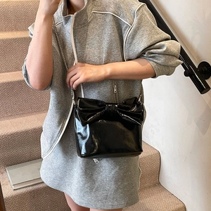 Fashion black patent leather bucket bag with large bow and silver chain strap
