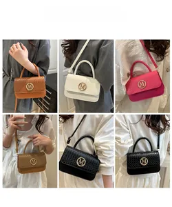 Multiple styles of fashion woven crossbody bags with golden M buckle and short handles