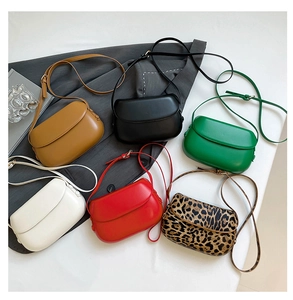 Collection of small PU leather crossbody saddle bags in solid colors and leopard print
