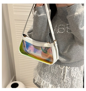Minimalist white baguette bag with holographic PVC panel shown on a model's shoulder