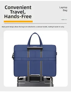Detail of navy laptop bag featuring a back strap for easy attachment to luggage handles