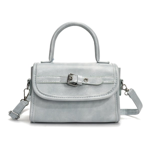 Elegant light blue faux leather square handbag with top handle and silver buckle strap