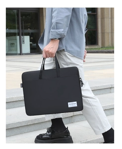 Close-up of durable black nylon business briefcase with side logo detail for office use