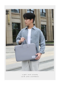 Minimalist light grey laptop bag for work and meetings with sturdy top handles