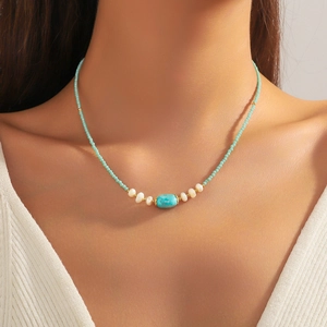 Bohemian choker necklace with turquoise center stone and natural freshwater pearls