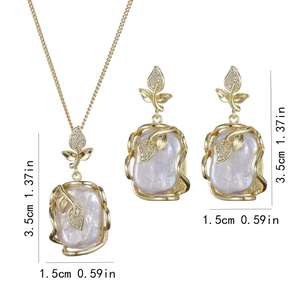 Baroque pearl jewelry set with golden leaves and crystals necklace and earrings
