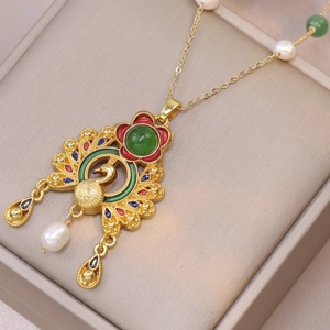 Peacock enamel necklace set with natural freshwater pearls and green gemstone in gold finish