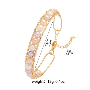 Handmade gold wire-wrapped bracelet with mixed pearls and heart charm extension