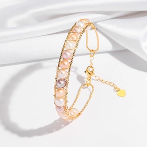 Handmade gold wire-wrapped pearl bracelet with multi-color natural pearls and heart charm