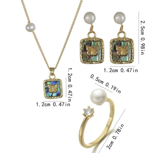 Golden titanium steel jewelry set with butterfly shell pendants and white pearls