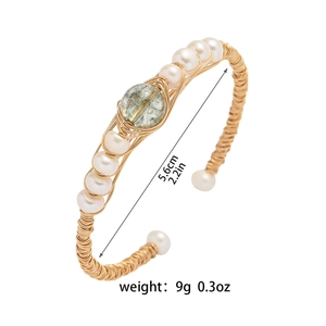 Handmade gold wire-wrapped open cuff bracelet with natural green stone and pearls