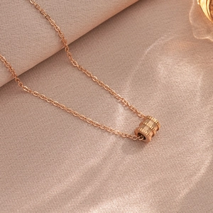 Elegant rose gold cylinder pendant necklace with fine vertical textures for women