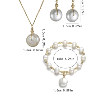 Golden jewelry set with baroque freshwater pearls including necklace bracelet and earrings
