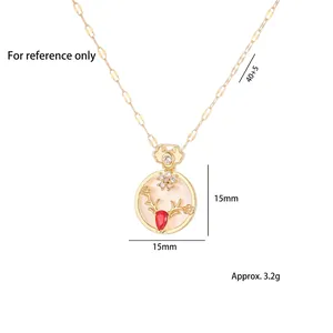 Gold-tone titanium steel necklace with deer head zircon flower pendant and red gem