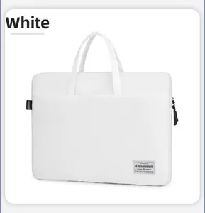 Detailed view of the white minimalist canvas laptop bag with durable double handles
