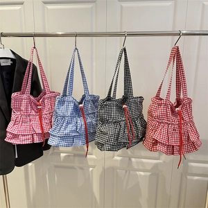 Checkered tote bag with double ruffles and drawstring closure in four vibrant colors