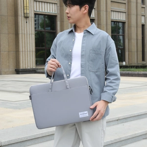 Minimalist light gray canvas laptop bag with hidden handles for 15.6 inch notebook