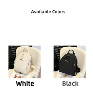 Detailed comparison of white and black wrinkled nylon backpacks with zipper closure