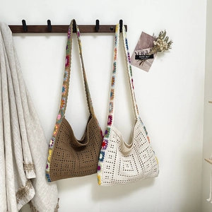 Handmade crochet shoulder bags with colorful floral straps for boho beach vacations
