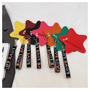 Star-shaped leather coin purses in seven vibrant colors with LOVE lettered wrist straps