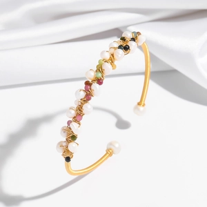 Elegant gold wrap cuff bracelet with natural pearls and colorful tourmaline beads
