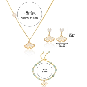 Exquise ginkgo blad sieradenset met ketting oorbellen en armband in goudkleurige look