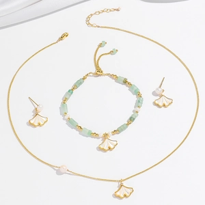 Ginkgo blad sieradenset met ketting armband en oorbellen in goud en groen