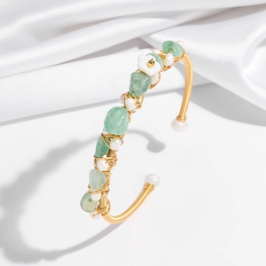 Artisanal open bangle with natural green aventurine, white pearls and floral accents