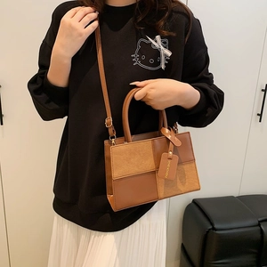 Fashion contrast color rectangular crossbody bag in caramel leather with round handles